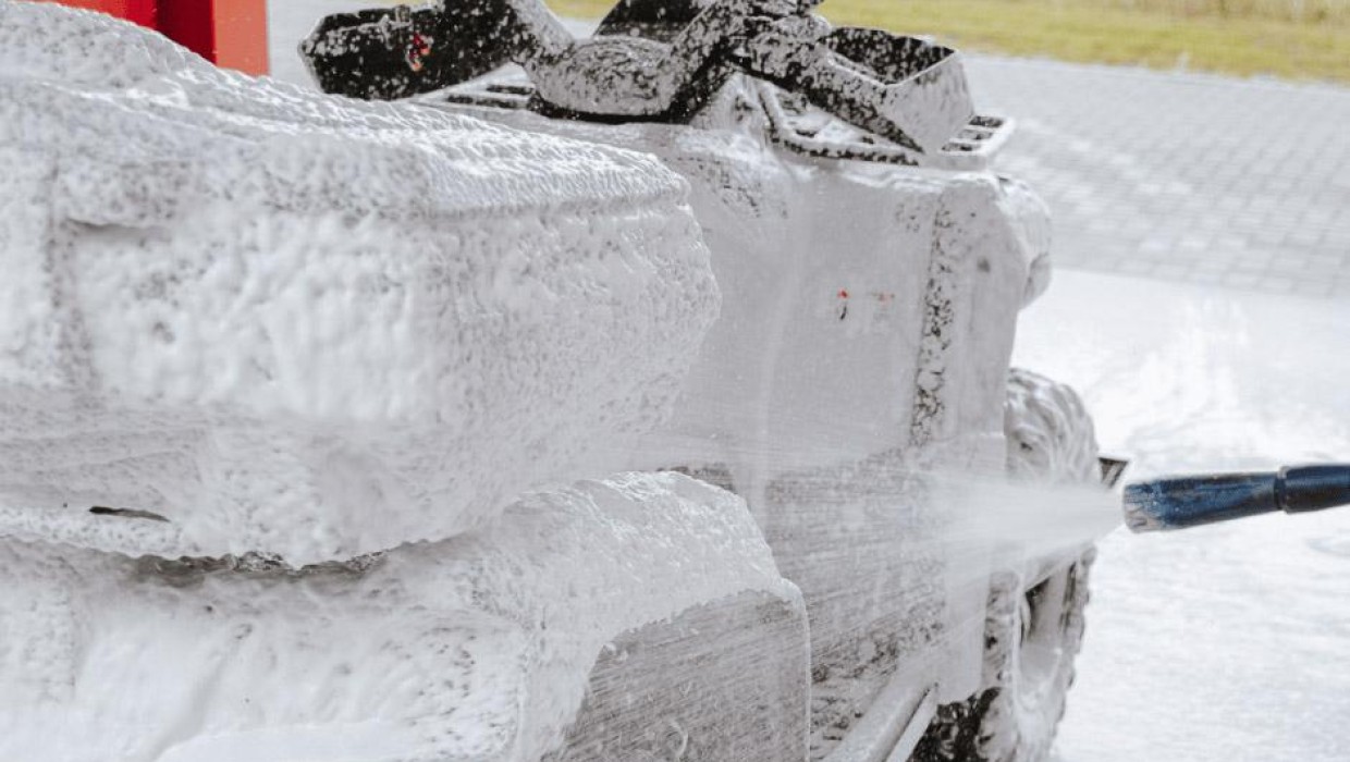 Quad bike covered in foam at PUTO car wash.